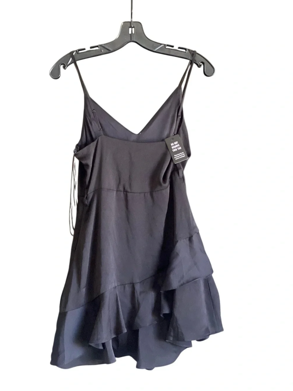NWT Express Black Romper with Ruffled Hem. Size Small.